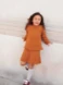 Bild på "AUGUSTINE SWEATER AND SKIRT JUNIOR" stickad i en tråd Sunday och en tråd Tynn Silk Mohair, 2408-7a+7b