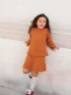 Bild på "AUGUSTINE SWEATER AND SKIRT JUNIOR" stickad i en tråd Sunday och en tråd Tynn Silk Mohair, 2408-7a+7b