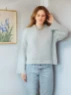 Bild på "HEATHER SWEATER CABLE EDITION" stickad med en tråd Tynn Peer Gynt och en tråd Tynn Silk Mohair 2409-13