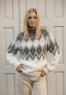 Bild på "Symphony of Sweater i Snorre" mönsterkatalog rån VikigGarn 2426