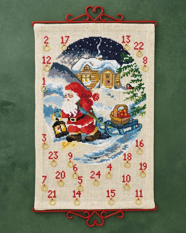 Bild på Tomte med äppelkorg