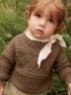 Bild på "Guernsey Sweater Baby" stickad i Doble Sunday eller två trådar Sunday 2413-1a och 1b