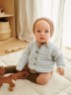 Bild på "Filip" Cardigan, pants och mössa tickade i Babyull Lanett  2413