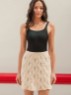 Bild på "Summer skirt kort och lång och top" stickad i Tynn Line 2504-3a+b+c