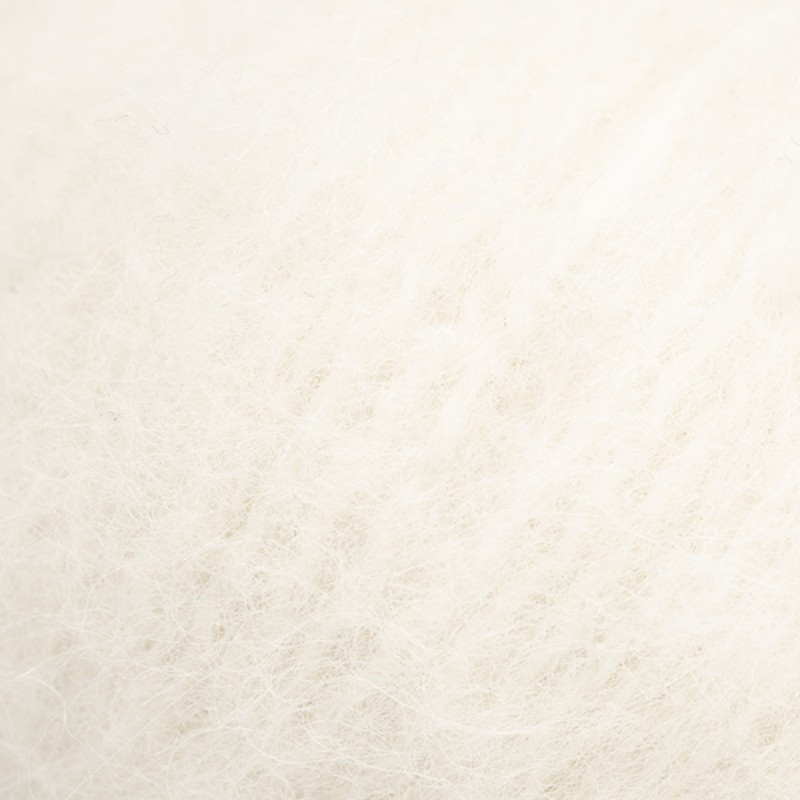 Bild på ”Scenic Snow” mössa och halsvärmare stickade i Balder, Julkit