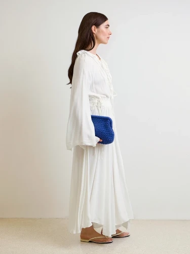 Bild på "Basket Clutch" virkad i Double Sunday och Tynn Silk Mohair 2602-1