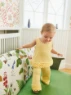 Bild på "Rosette Pants and top"  stickade i Mandarin Petit 2603-7