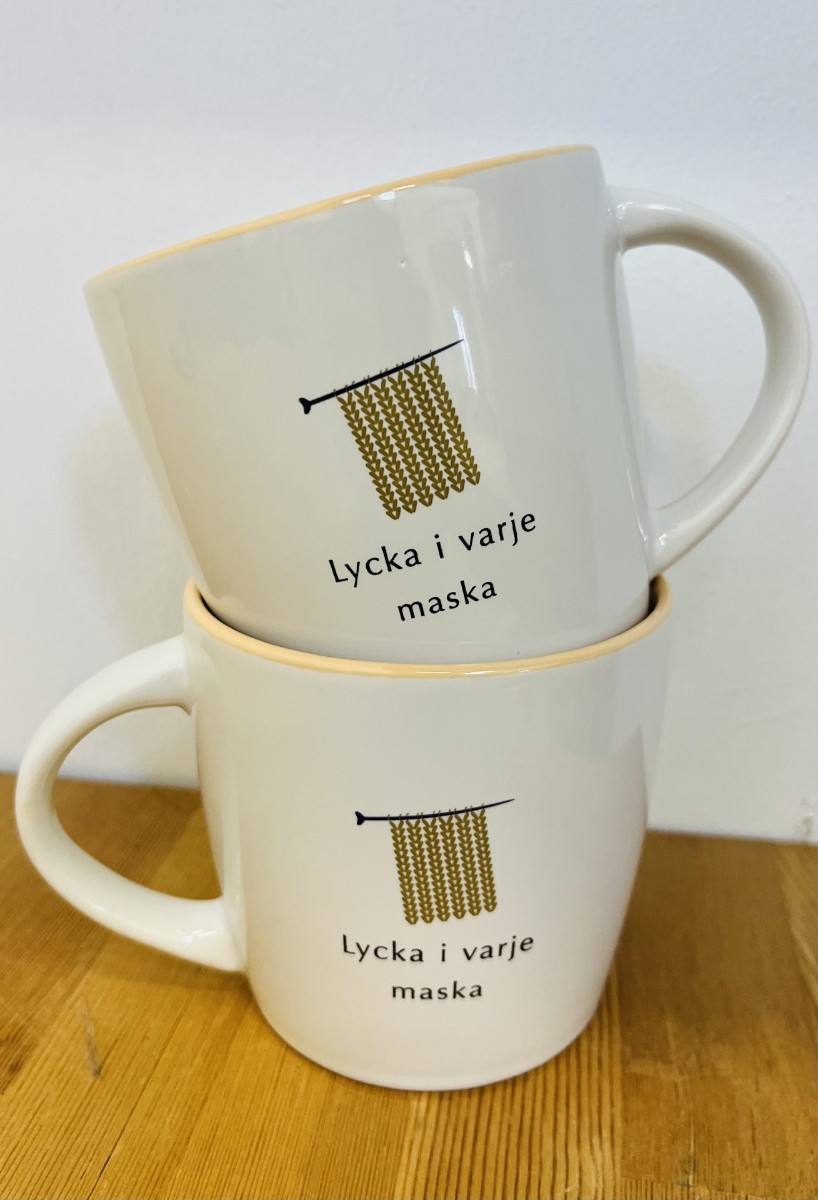 Bild på "Lycka i varje maska" 1st mugg